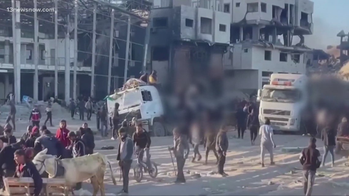 Israeli troops open fire on Palestinians trying to get food from convoy, witnesses say [Video]