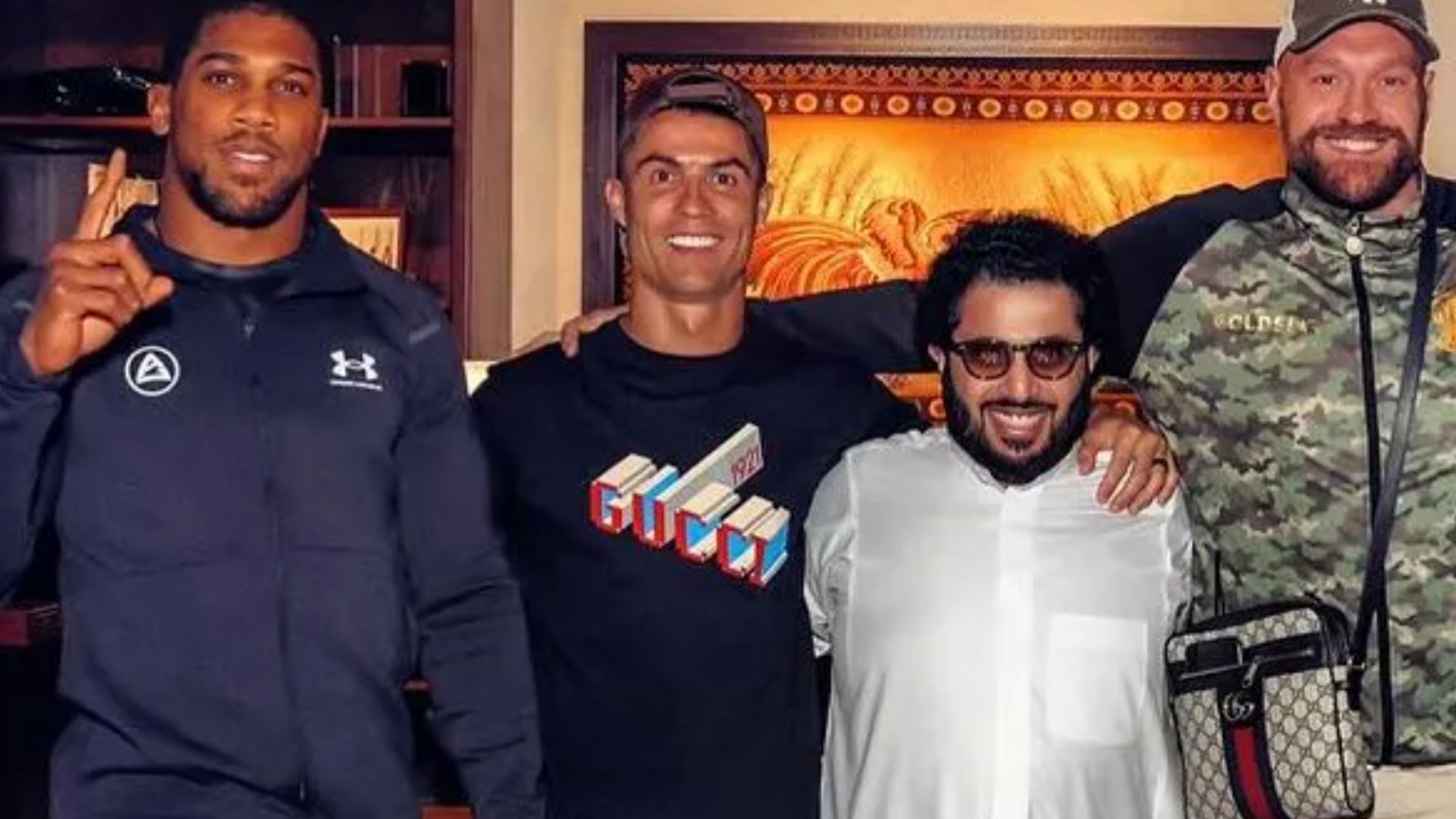 Anthony Joshua and Tyson Fury ‘never said a word to each other’ during tense meeting with Cristiano Ronaldo [Video]