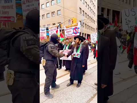 Embracing unity  A uniformed individual shares a selfie moment with a Jewish Rabbi [Video]