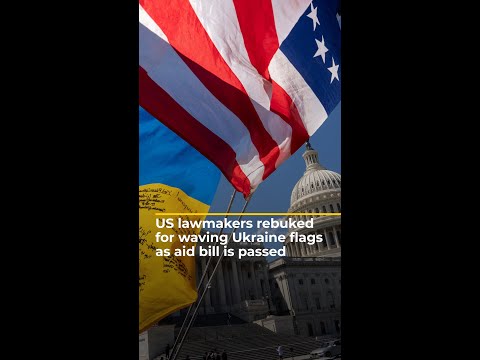 US lawmakers rebuked for waving Ukraine flags as aid bill is passed | AJ [Video]