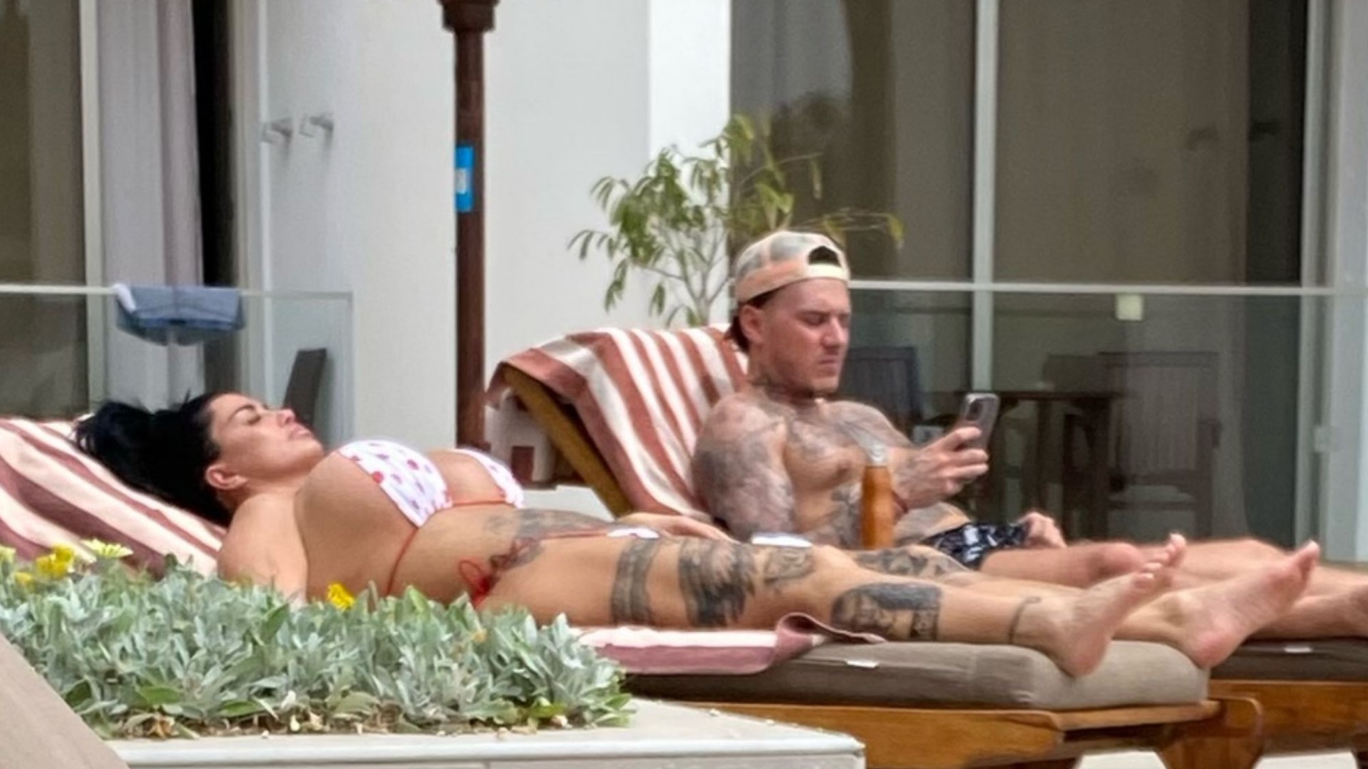 Katie Price relaxes poolside at 760-a-night hotel in Ayia Napa after dodging bankruptcy hearing due to ‘anxiety’ [Video]